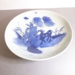 Yongzheng period (1723-1735) - a Chinese porcelain bowl decorated in underglaze blue with two horses