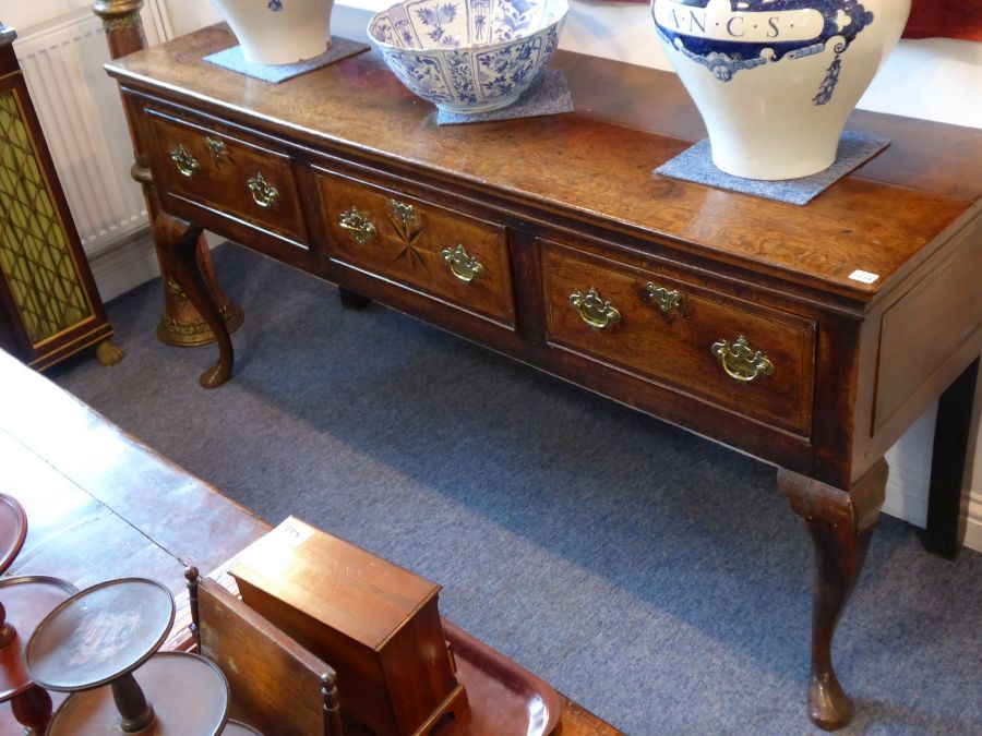 A good mid 18th century oak dresser base; the moulded top above three frieze drawers, the central - Image 8 of 8