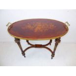 A late 19th / early 20th century oval kingwood-topped, two-handled centre table; the central