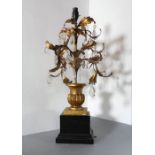 A decorative gilt metal table lustre lamp on square stamped wooden base (64cm highest including