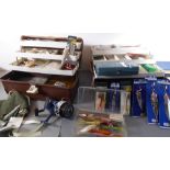 Two tackle boxes containing a variety of fishing tackle and equipment to include lures, a freshwater