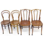 A pair of early 20th century bentwood chairs (Polish) with steamed decorative seats, together with