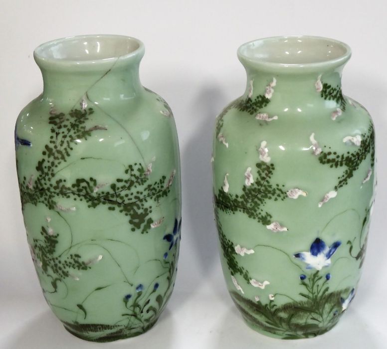 A pair of 19th century Japanese porcelain vases; hand-decorated with swallows and in the air above - Image 2 of 4