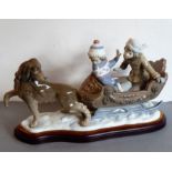 An usually large Lladró porcelain figure group, 'Sleigh Ride'. Finely hand-decorated and with