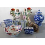 A selection of ceramics to include a pair of 19th century Staffordshire spill vases, a late 19th