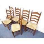 A set of six early 19th century style (reproduction) Lancashire ladderback oak chairs, each with