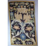 A needlework tapestry in 17th / 18th century style; two doves perched upon scrolling leaves and