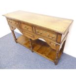 A good solid oak reproduction 18th century-style dresser base; the moulded top above an