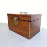 A George III period mahogany box of rectangular section; the brass swan neck handle above a brass