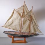 A scale model of an early 20th century two-mast yacht (approx 113cm in length and 48cm high)