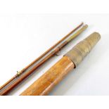 A circa 1900 three-piece fly fishing rod made for Luscombe & Co., Deura Dun (stamped on brass reel