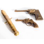 Two 1920s / 1930s metal toy pistols (one possibly associated to The Dandy comic) and a 19th