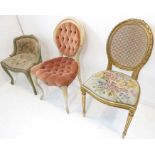 A single shabby chic-style painted wood and faded pink upholstered buttonback and seated chair in