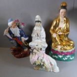 Four well-modelled hand-decorated Chinese porcelain figures. The larger two of goddesses, and the