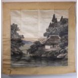 An early 20th century Japanese painting on silk depicting a building by waterside with hills and