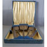 A hallmarked silver Art Deco style/period lady's dressing table set: hand-held mirror and a pair