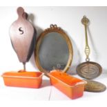 A pair of orange enamel 11" Le Creuset two-handled pâté dishes and covers, together with antique
