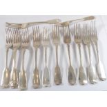 Twelve mostly early 19th century hallmarked silver table forks in the fiddle and other patterns (