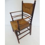 A good late 19th century William Morris style armchair; stained wood (probably ash and beech),