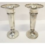 A pair of hallmarked silver conical-shaped bud vases; Sheffield assay marks and maker's marks for