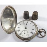 A late 19th / early 20th century silver-cased full-hunter pocket watch; white enamel dial, key-