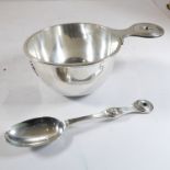 A fine and heavy hallmarked silver bowl with applied handle with circular terminal, together with