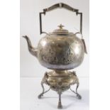A large 19th century silver-plated spirit kettle and stand; shaped handle with ivory insulators