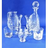 A very fine and heavy cut-glass crystal decanter of tapering triangular form, together with a cut-