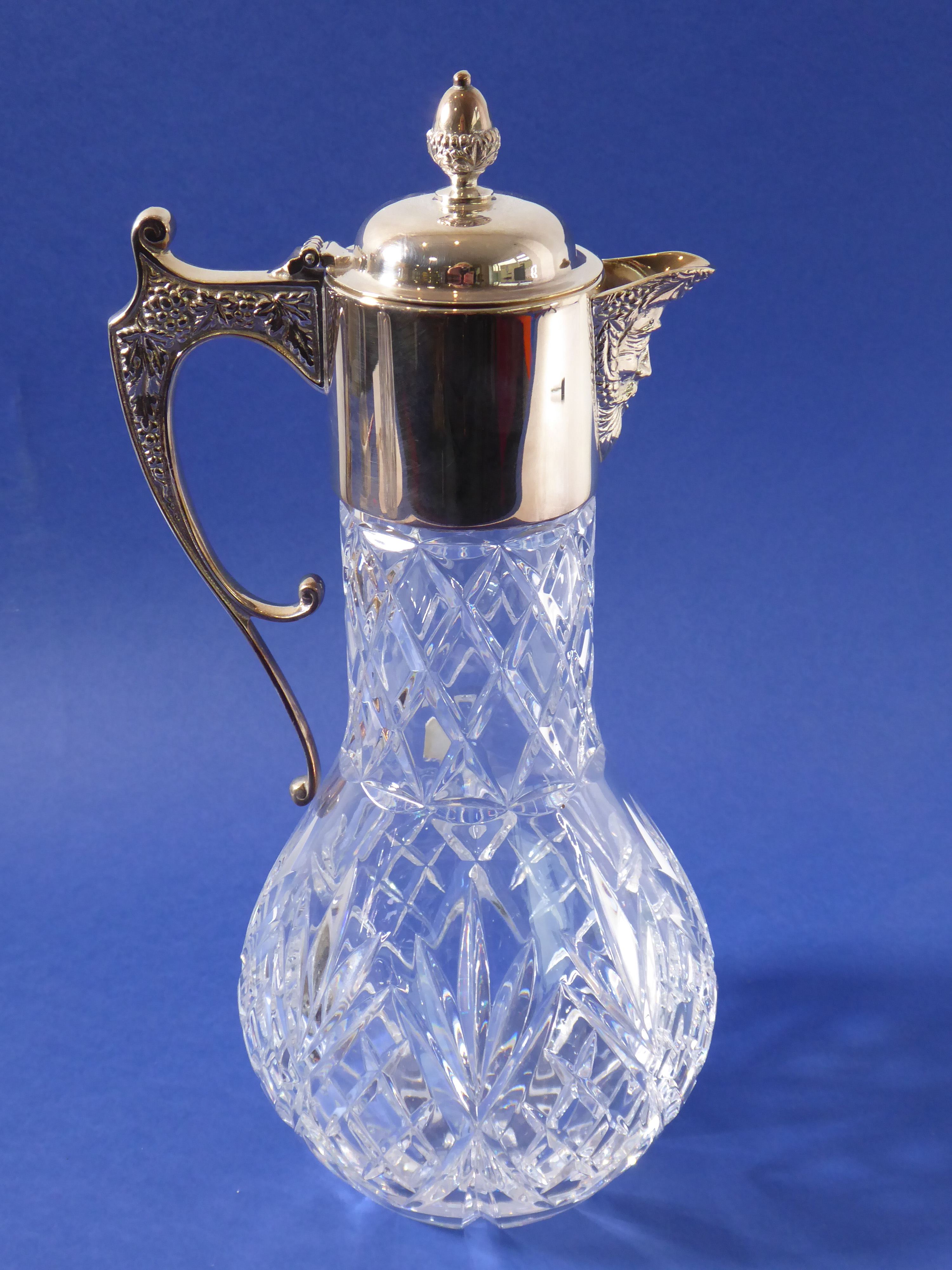 A Portuguese lead crystal claret jug; baluster-shaped, silver-plated mounts with the spout - Image 4 of 6