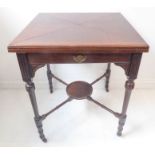 A late 19th / early 20th century mahogany card table – envelope-style foldover top raised on four