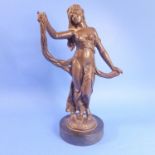 A 19th century bronze of Terpsichore on circular wooden socle (26cm high)