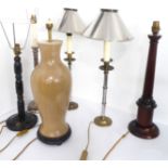Table lamps and shades to include a baluster-shaped ceramic example, a pair of brass and steel table