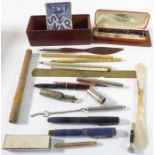 An assortment to include early to mid 20th century fountain pens, two letter openers (one Japanese