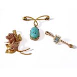 An Edwardian rectangular aquamarine and seed pearl bar brooch (length 3.4cm); a collet-set ovoid