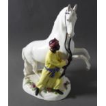 A 19th century hand-decorated Meissen porcelain figure after J J Kändler – rearing grey stallion and