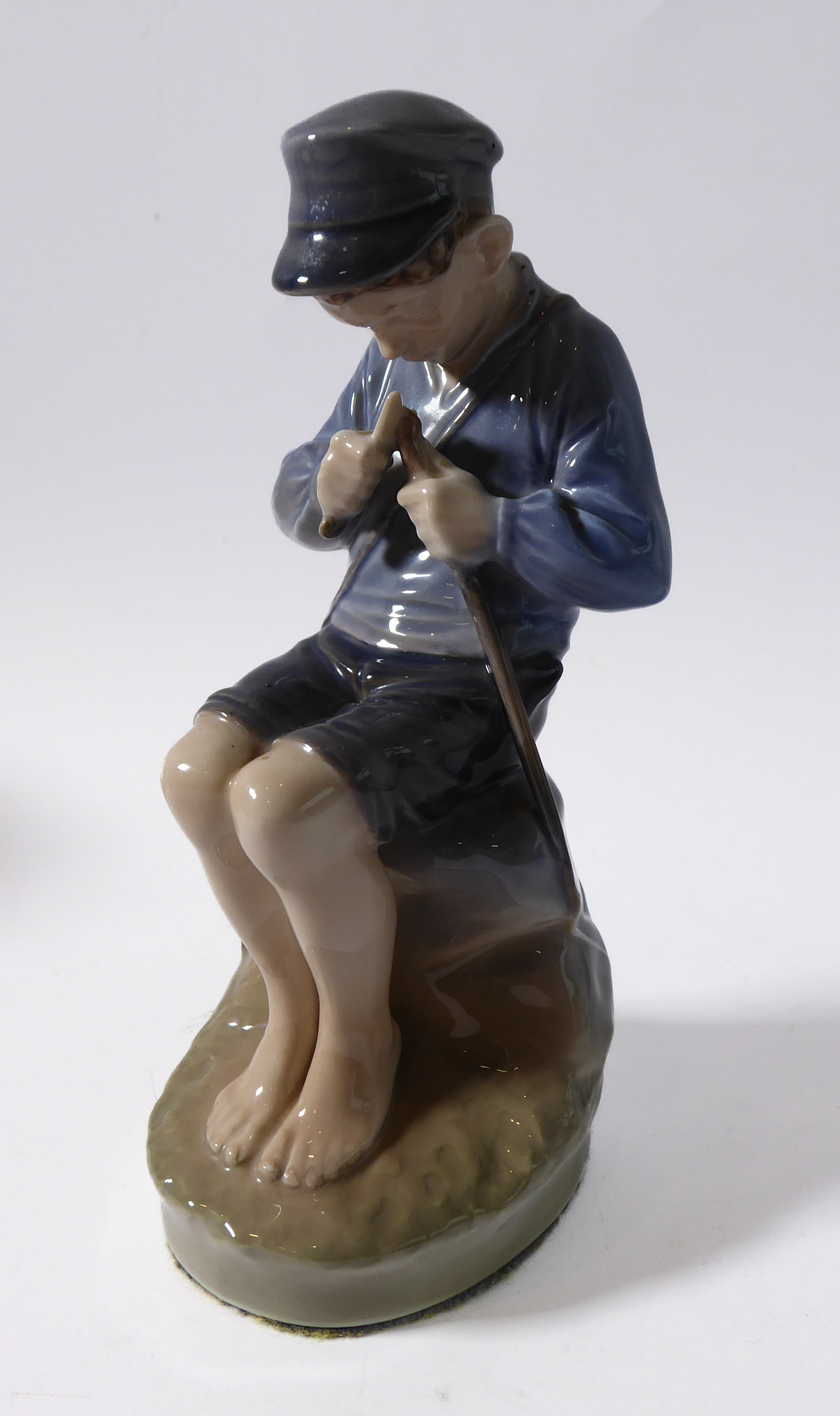 Royal Copenhagen porcelain figure group (mid 20th century, Danish factory), a seated young boy - Image 2 of 10