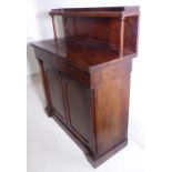 A late Regency / early Victorian mahogany chiffonier; the three-quarter galleried superstructure