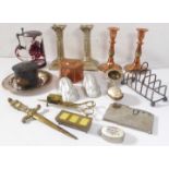 Metalware to include a pair of copper candlesticks, a further pair of table candlesticks modelled as