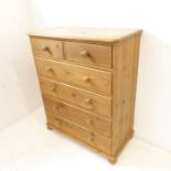 A pine chest of drawers, two half-width drawers over four full-width (92 x 45 x 111cm)
