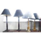 Two pairs of lamps: a good pair of mahogany cluster column lamps with shades and a pair of natural