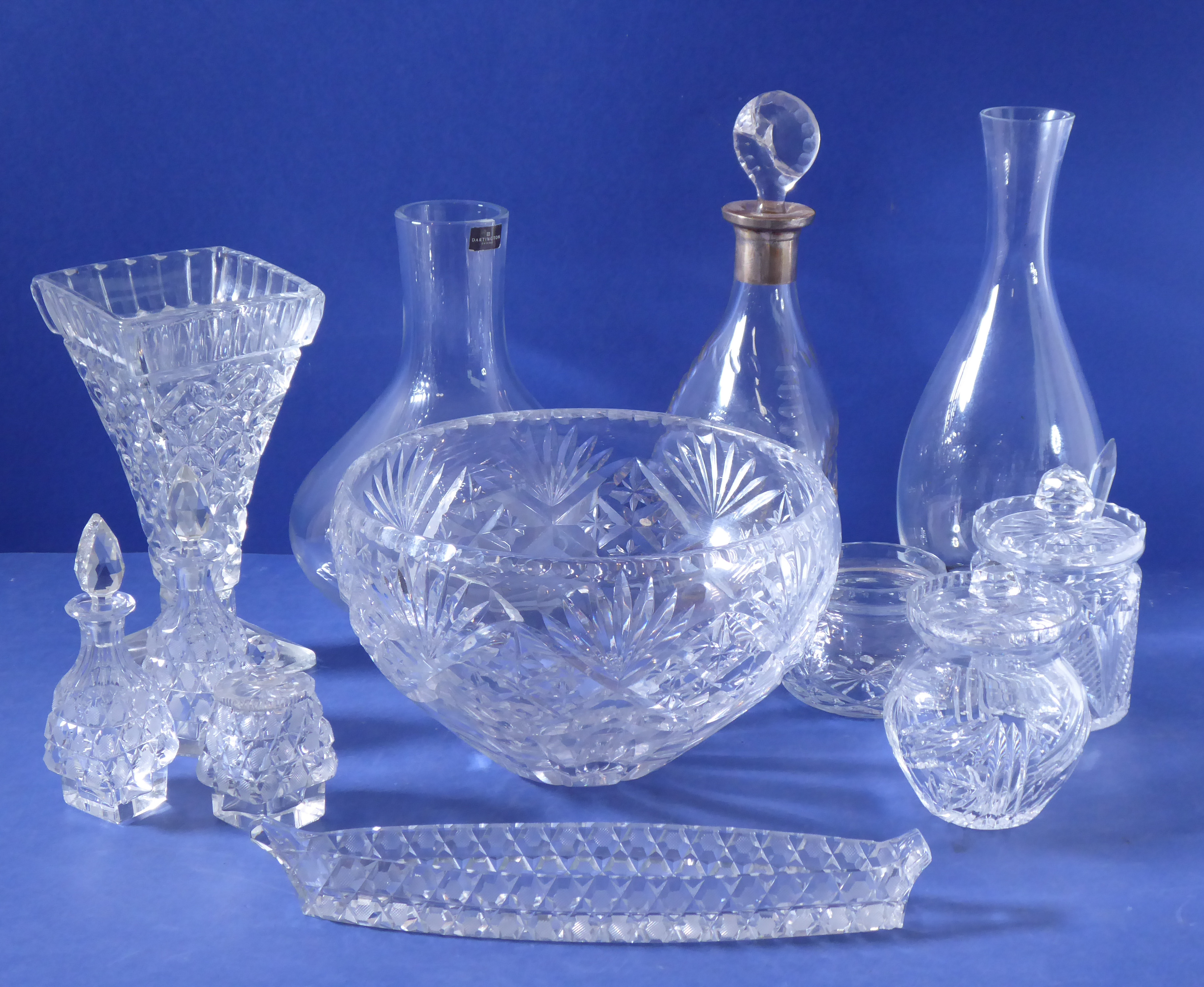 A good selection of glassware to include a heavy cut-glass bowl, a Dartington crystal decanter,