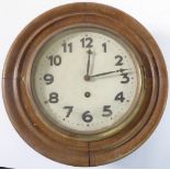 An early 20th century oak-cased wall-hanging school-style clock with German movement (for