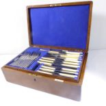 A fine early 20th century oak-cased silver plated flatware and cutlery service comprising six