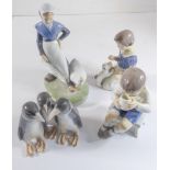 Four mid-20th century Royal Copenhagen porcelain figures (Danish factory): a young girl with