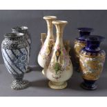 Three pairs of vases: late 19th century Royal Doulton Slater's patent decorated with flowers;