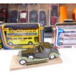 An assortment of Solido, Corgi and Breyer models: 14 x Solido vintage cars in perspex cases 5 x