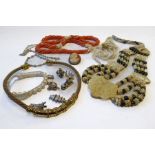 Assorted jewellery: a mesh-link torc necklace signed 'Mortiz' in maker's case; a six-strand coral
