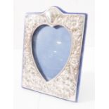 A London hallmarked silver heart-shaped easel picture frame