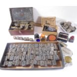 A large variety of brass / bronze printer's block letters, wooden block letters, a boxed Brinco