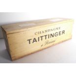A jeroboam (3 litres) of Taittinger champagne in its original wooden case. The case with shipping